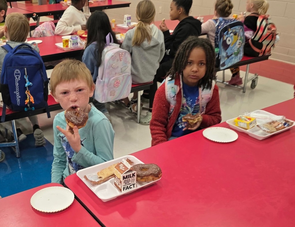 Kids with buddies and donuts