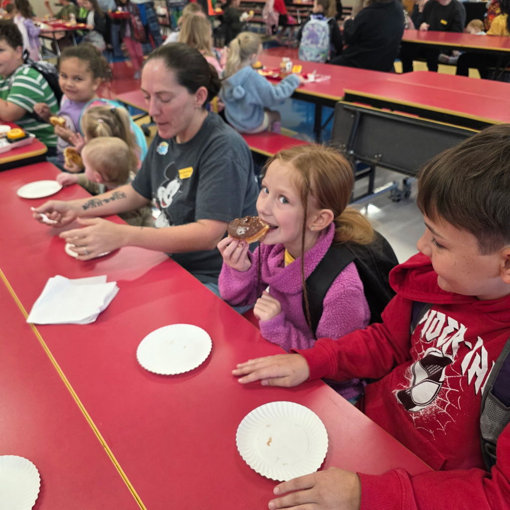 Kids with buddies and donuts