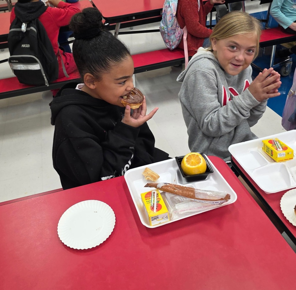 Kids with buddies and donuts