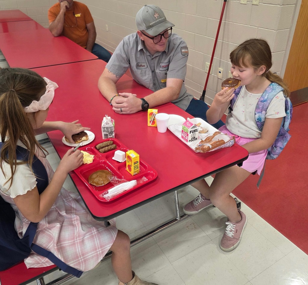 Kids with buddies and donuts