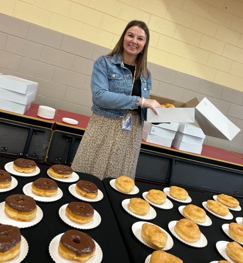 Mrs. Luckett helping at Donut table