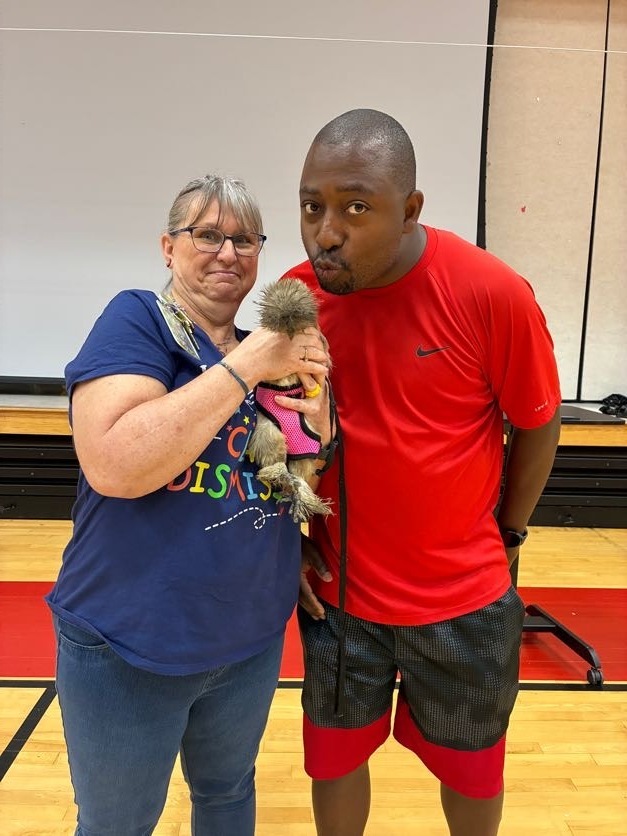 Coach Cash with Minnie Pearl the Chicken and Mrs. Milby