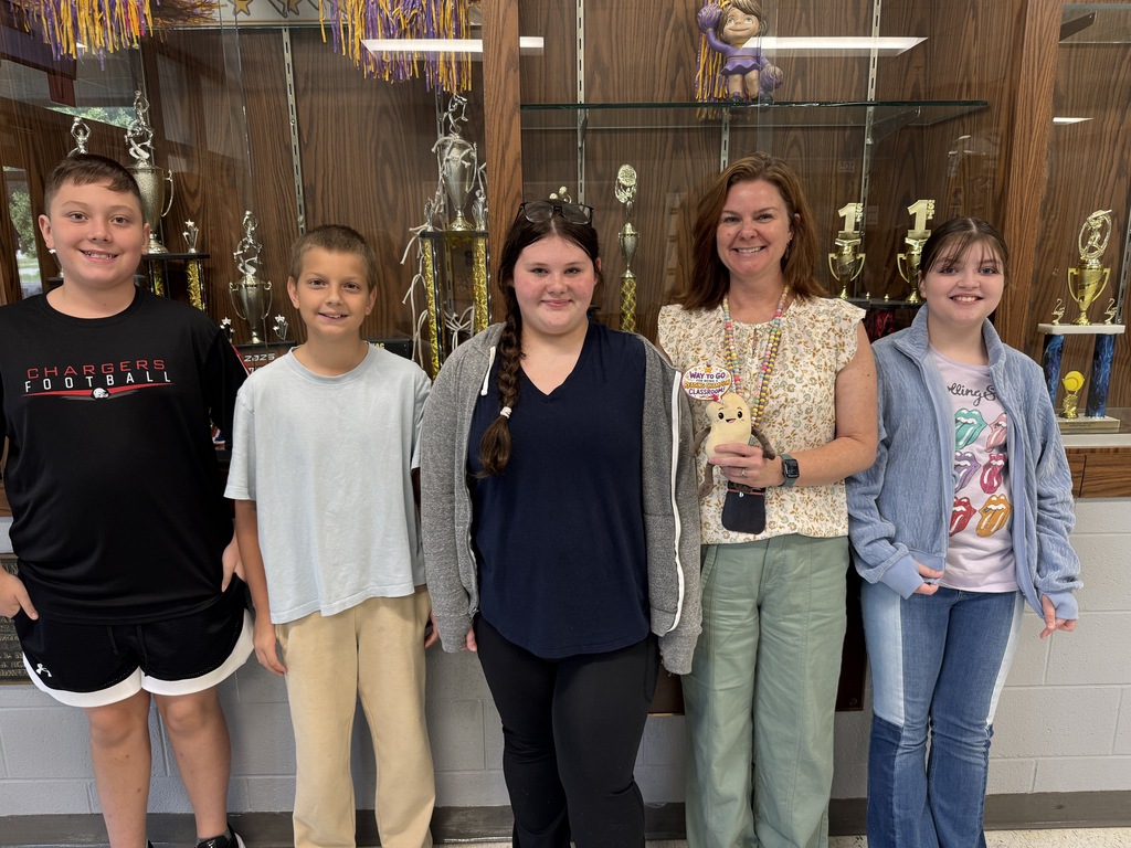 Benny and Ms. Johnston's Class Representatives with Ms. Johnston