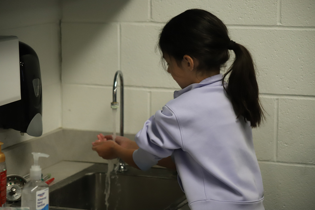 BEHS Health Science student present to elementary students about washing their hands correctly