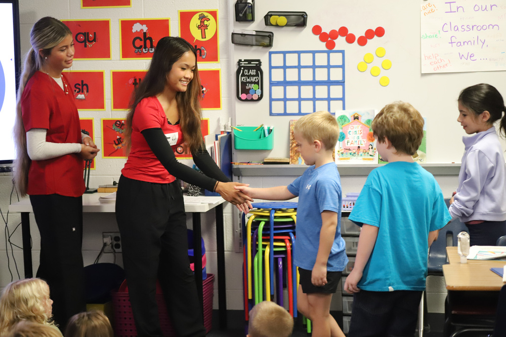 BEHS Health Science student present to elementary students about washing their hands correctly