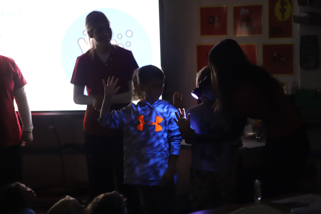 BEHS Health Science student present to elementary students about washing their hands correctly