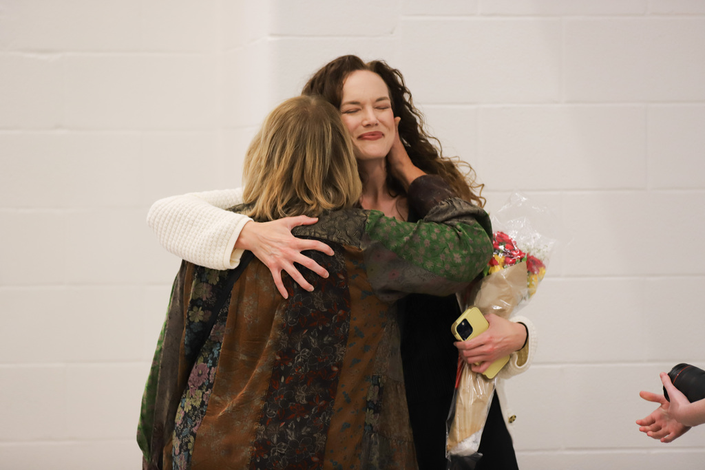 BEHS Arts Showcase from September 24th: Friends hugging in welcome