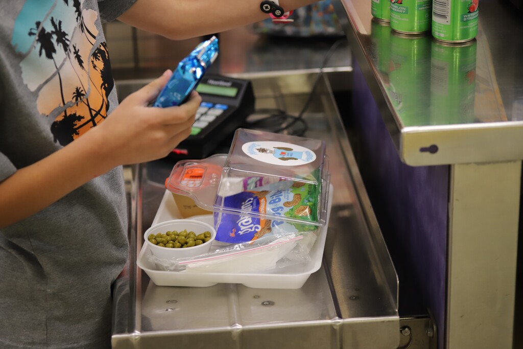 National school lunch week; students smiling and eating lunch