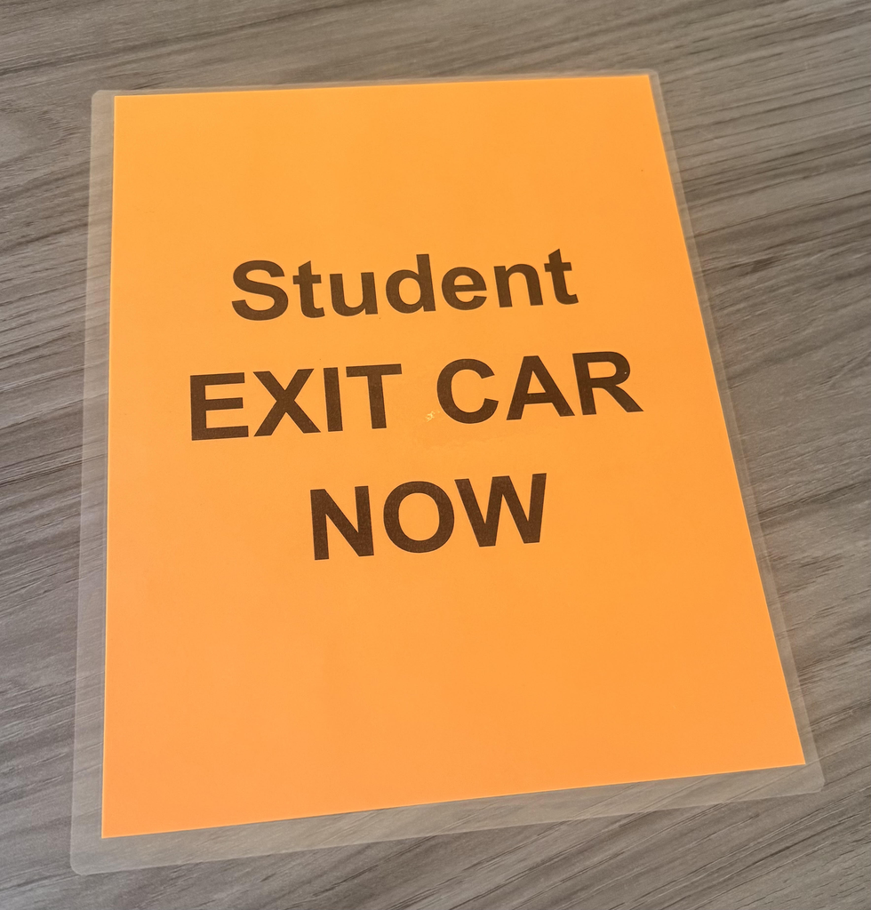 Exit car now sign