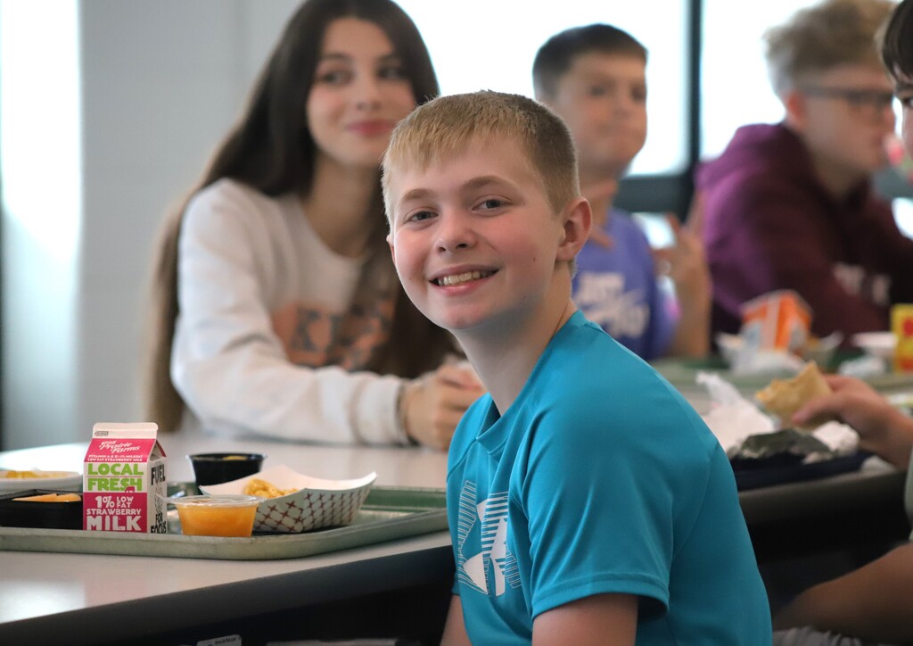 National School Lunch Week: Students being served and eating school lunch