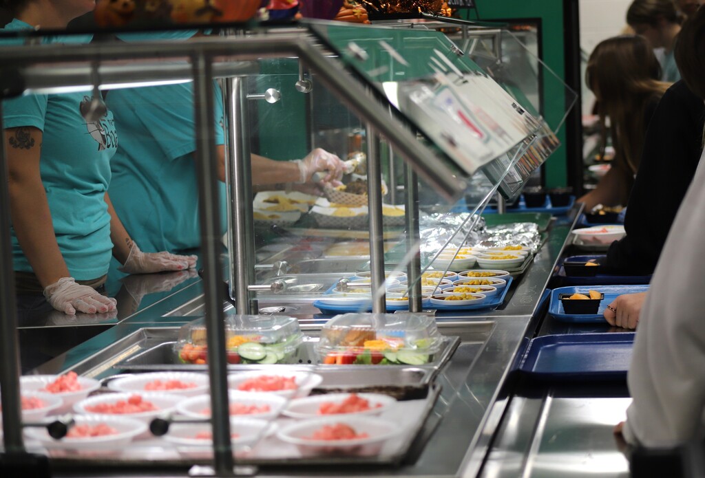 National School Lunch Week: Students being served and eating school lunch