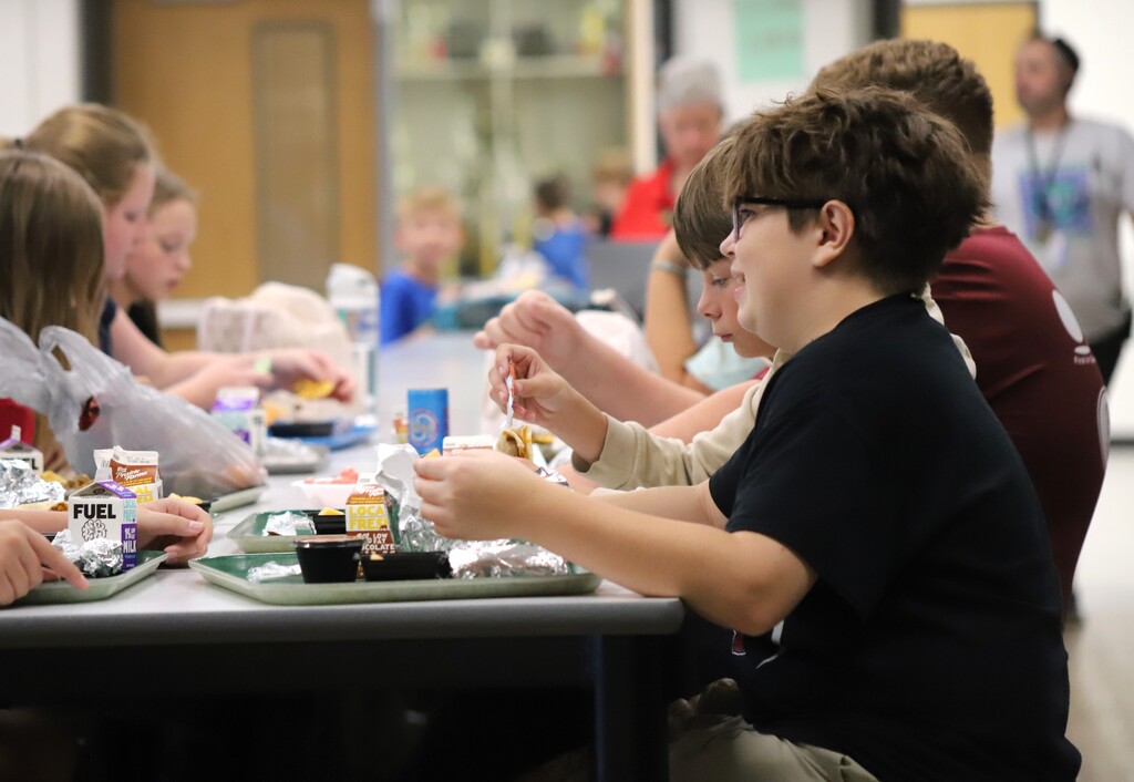 National School Lunch Week: Students being served and eating school lunch