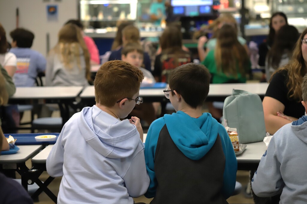 National School Lunch Week: Students being served and eating school lunch