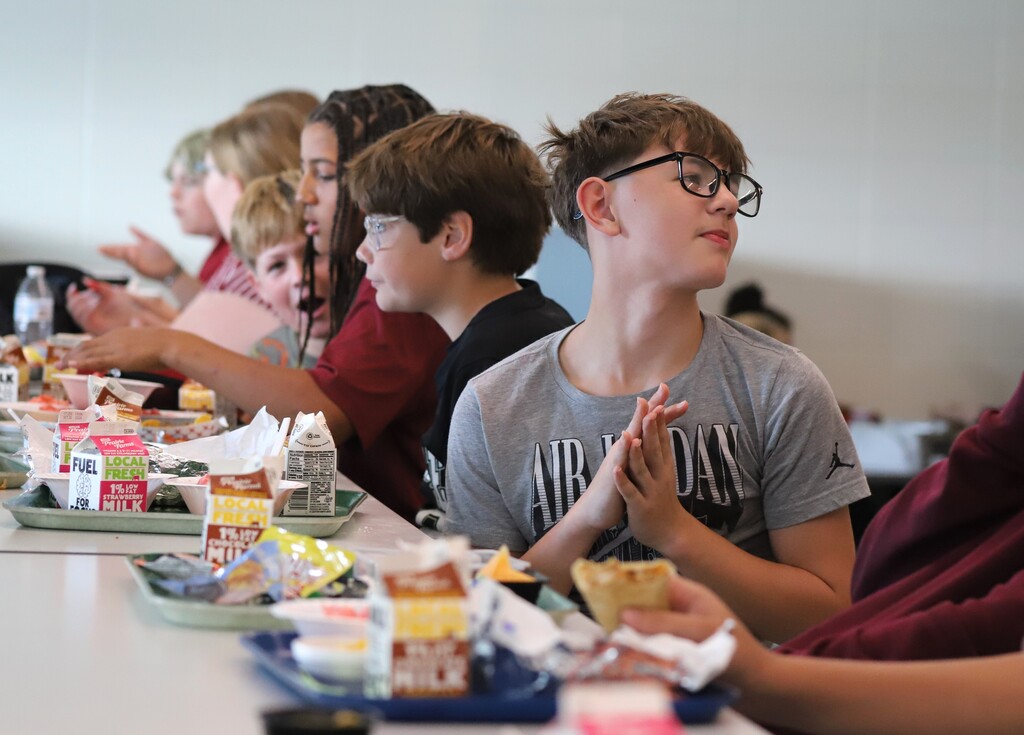 National School Lunch Week: Students being served and eating school lunch