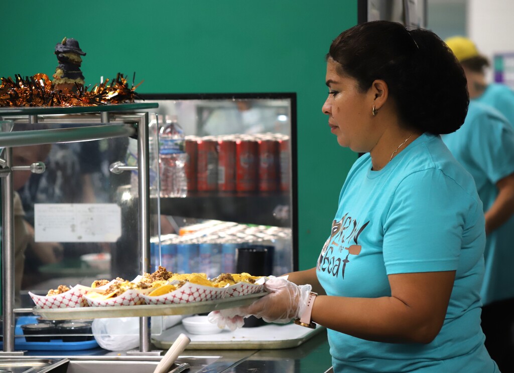 National School Lunch Week: Students being served and eating school lunch