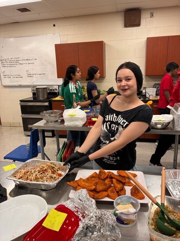 Hispanic Heritage Month: Students working in the culinary kitchen to create their dishes