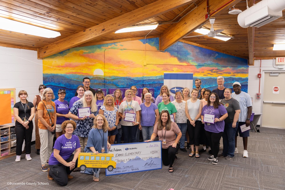 Subaru reps pose with Emma Elementary staff
