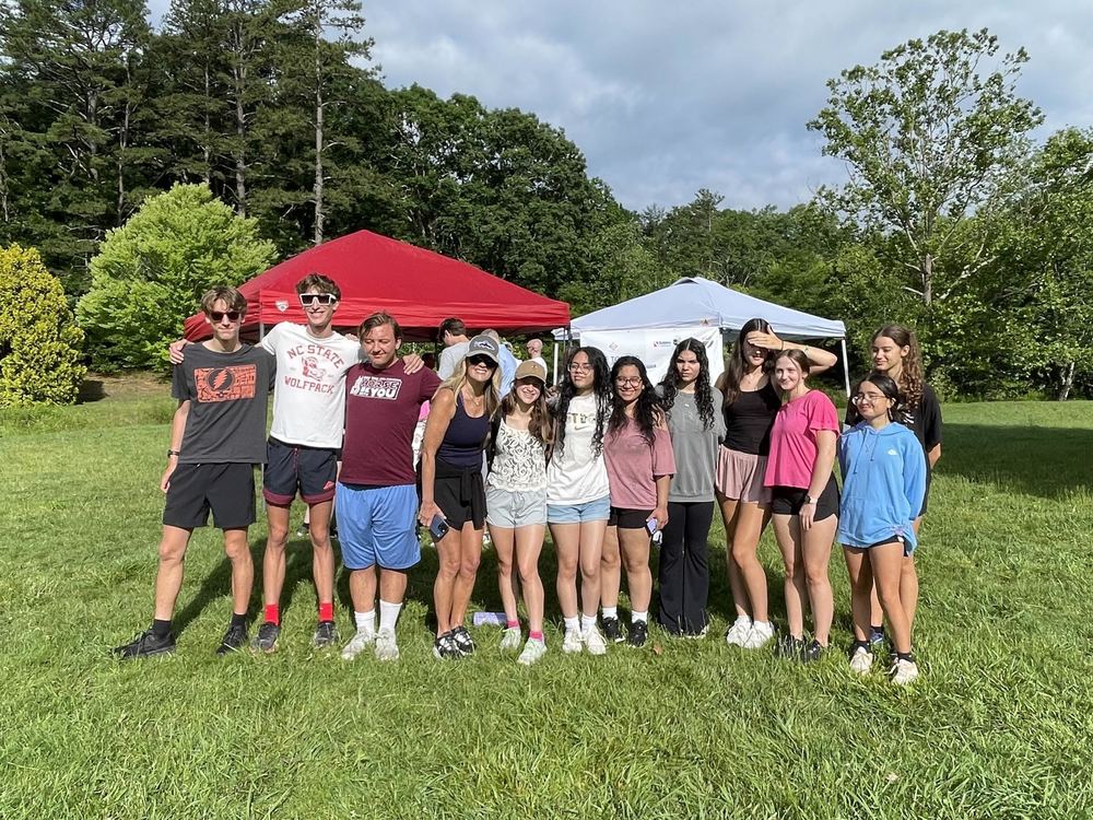 The Serve to Lead Club standing together for a photo.