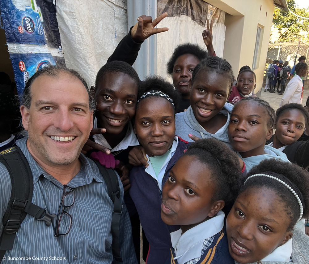 Mr. Dezio with a group of students.