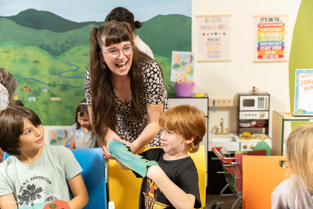 BCS TOTY Anna Kearney laughs with two children