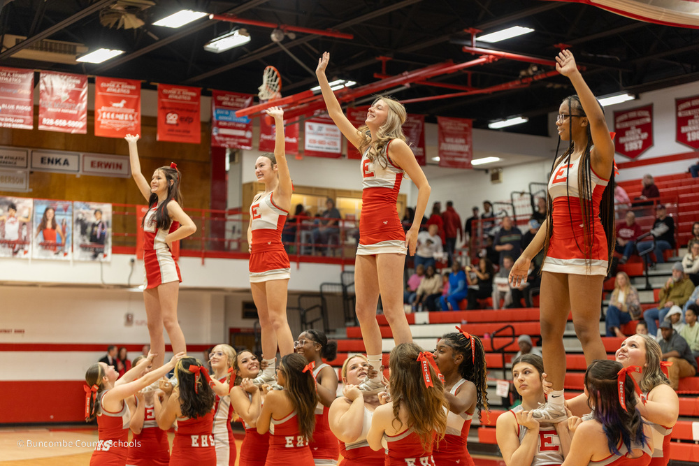 Erwin cheerleaders perform at center court before the girls basketball game