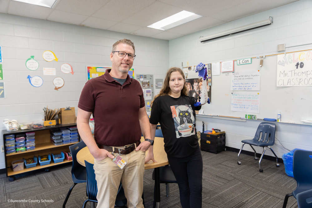 Teacher Russel Thompson with Student