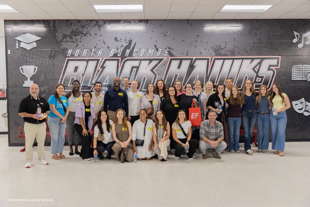 ef ambassadors pose with NBHS students and principals