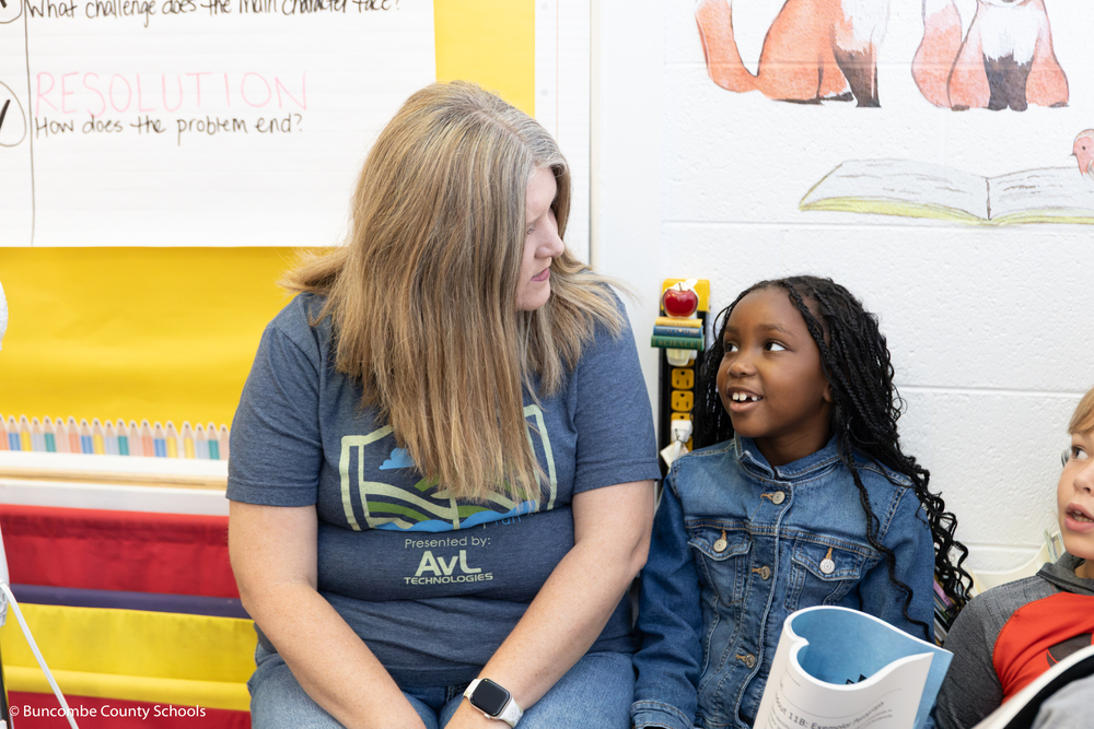 Ms. Wheeler helping a student. 