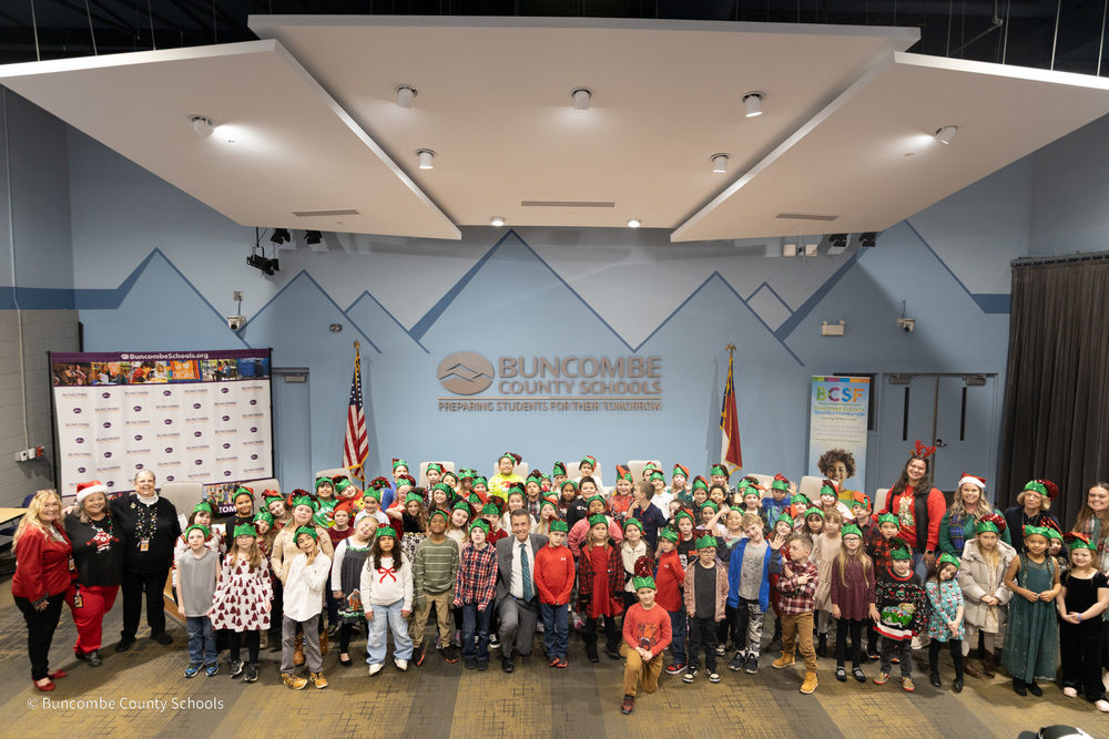 Leicester Elementary 2nd graders pose for a photo with Dr. Rob Jackson