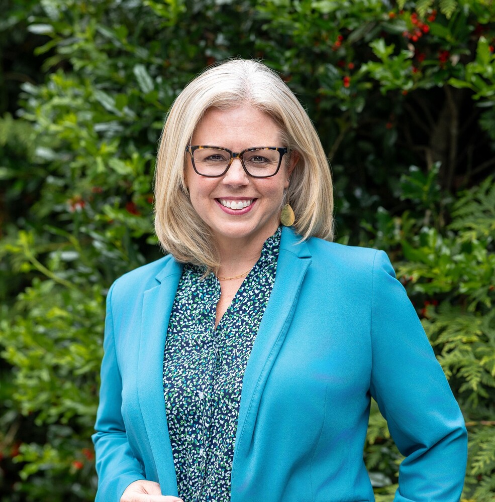 Dr. Jennifer Reed poses for a photo outside.