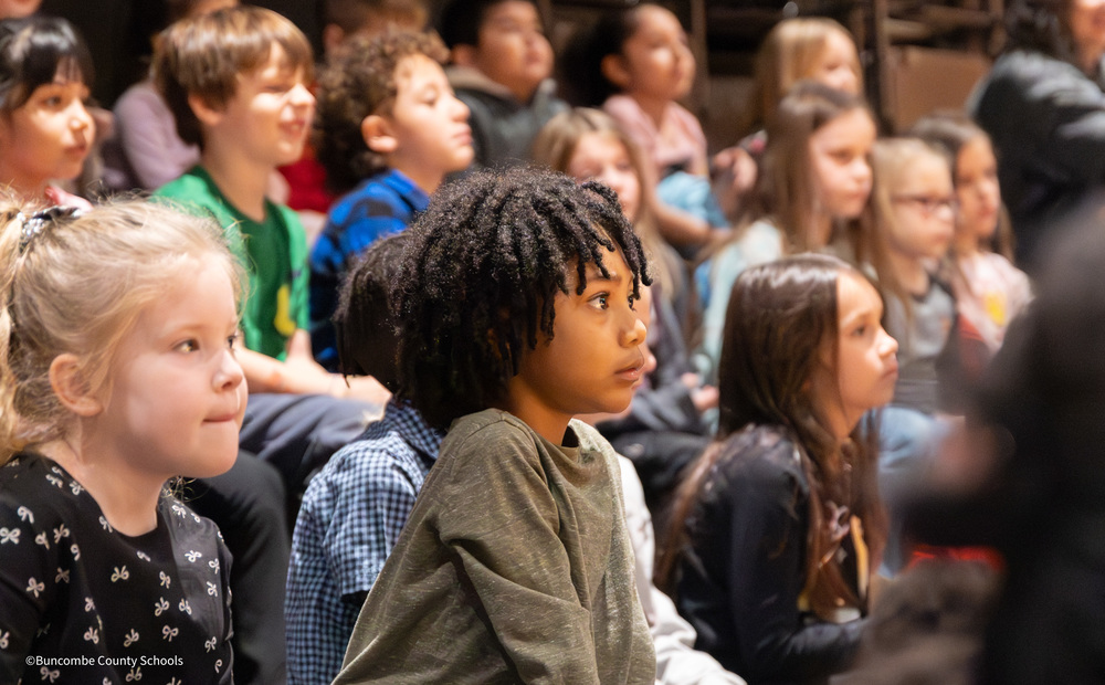 Student sitting with peers