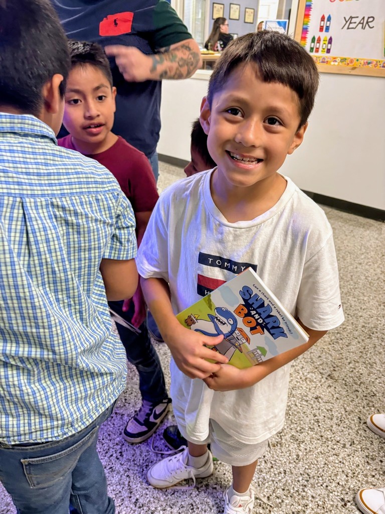 Kindergartener with new book