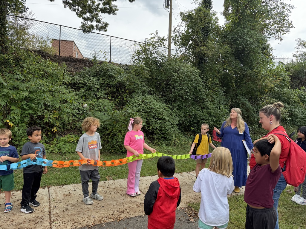 Students hold their gratitude chain