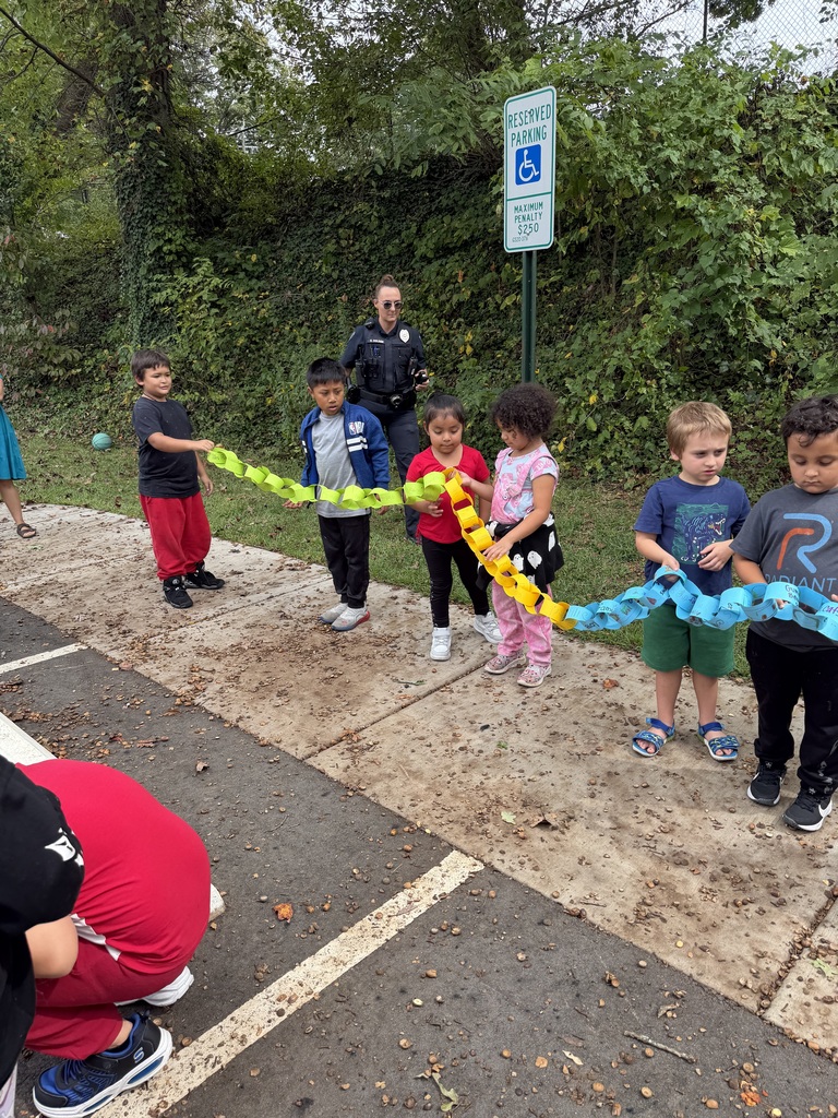 Students hold their gratitude chain