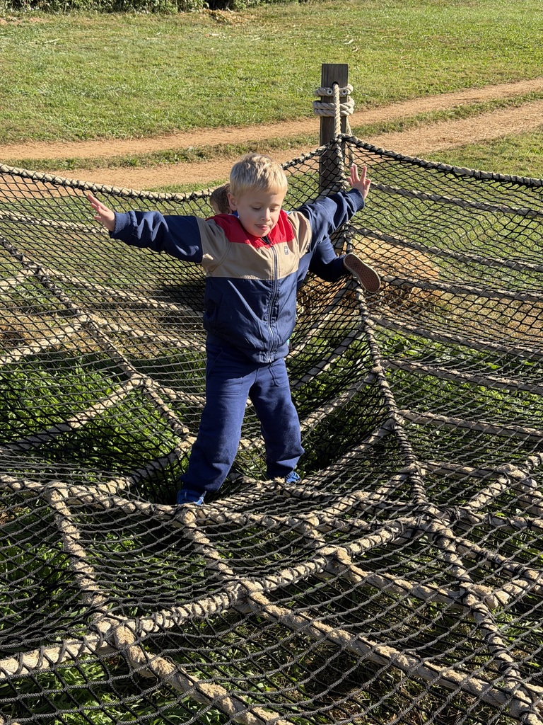 Student on spider web