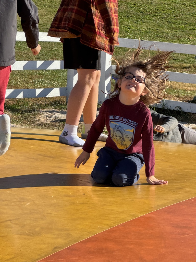 Student on bounce pillow