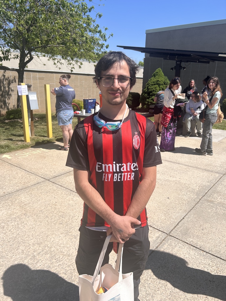 one student standing outside at the AB Tech festival 