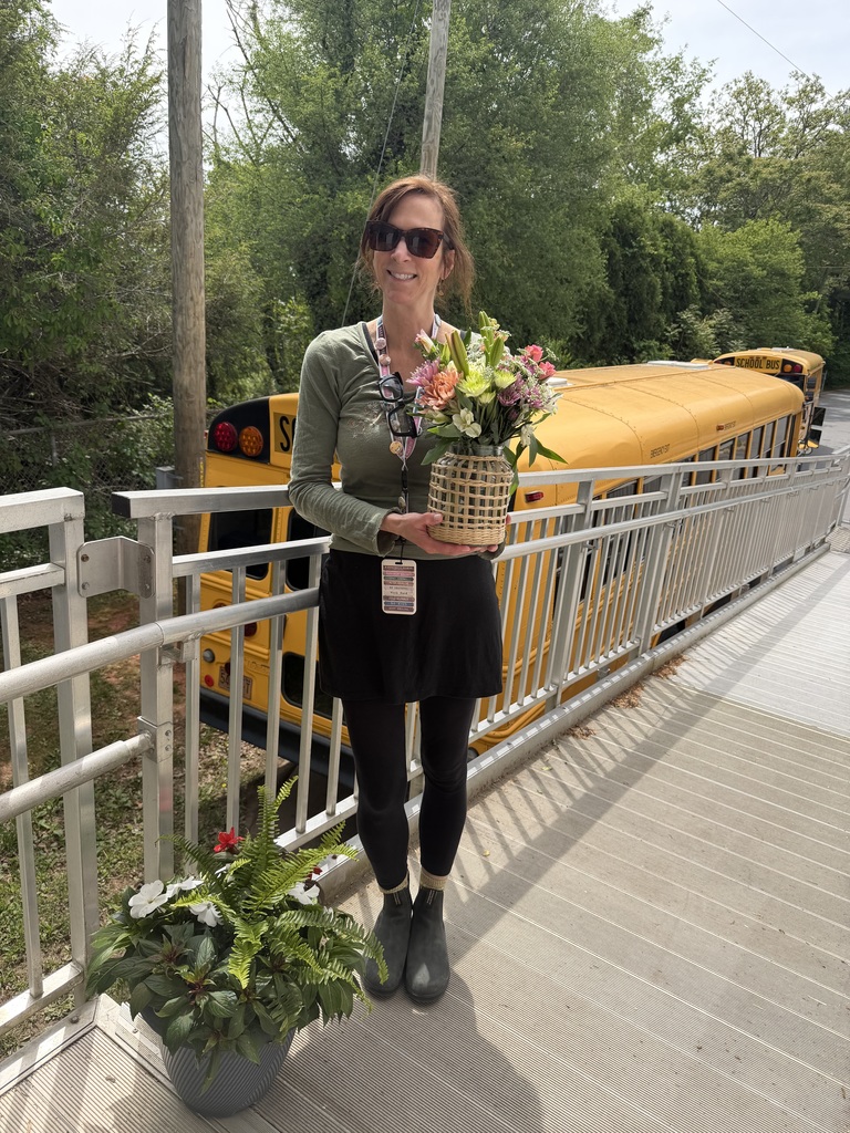 Gina holding her Principal Appreciation flowers
