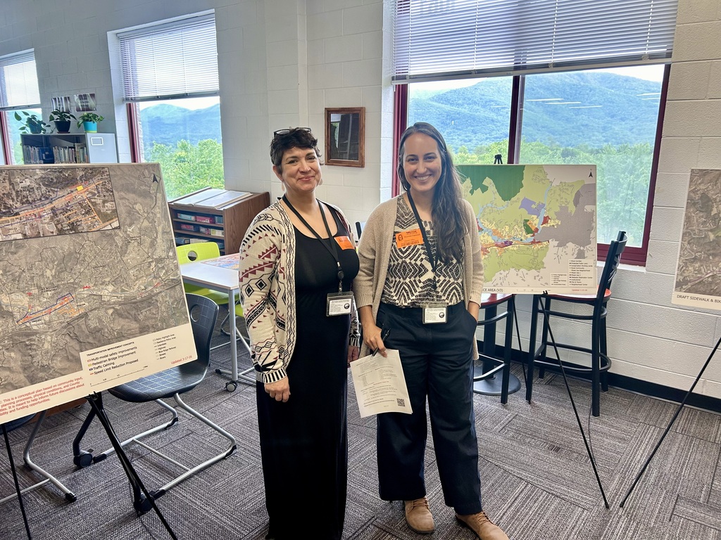 Buncombe County Planning Dept. representatives pictured in front of area maps to discuss Swannanoa's future and encourage input.