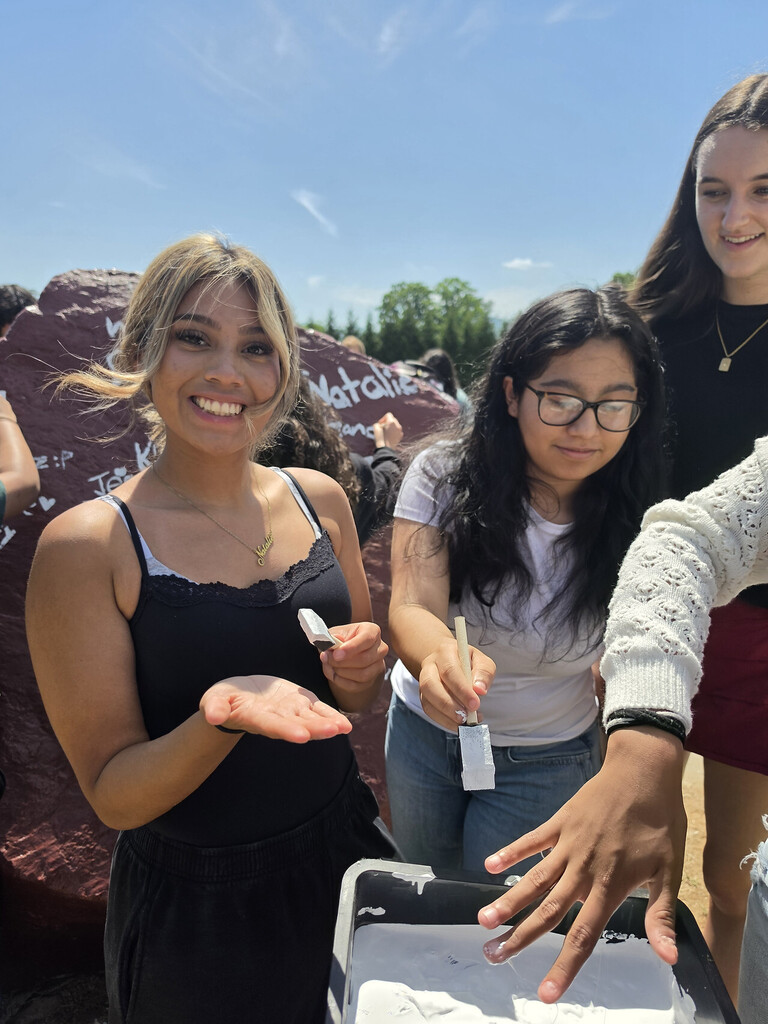 photo of OHS seniors painting Senior Rock