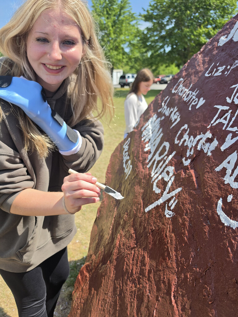 photo of OHS seniors painting Senior Rock