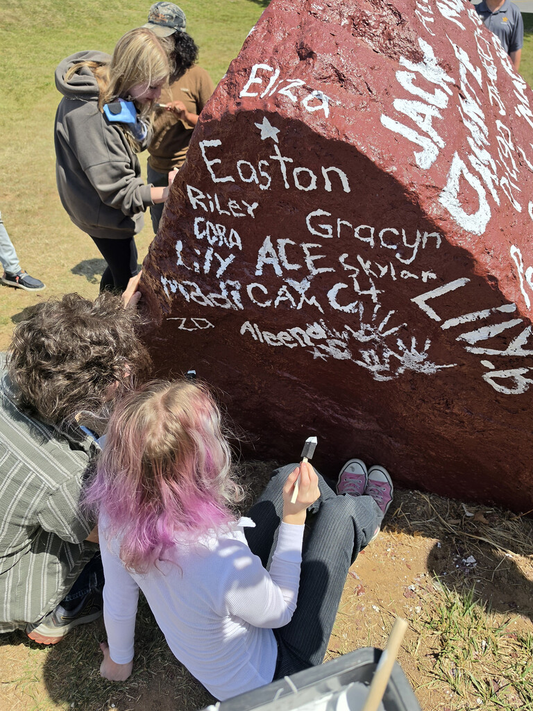photo of OHS seniors painting Senior Rock