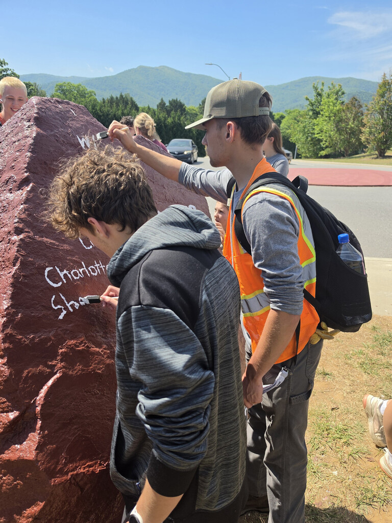 photo of OHS seniors painting Senior Rock