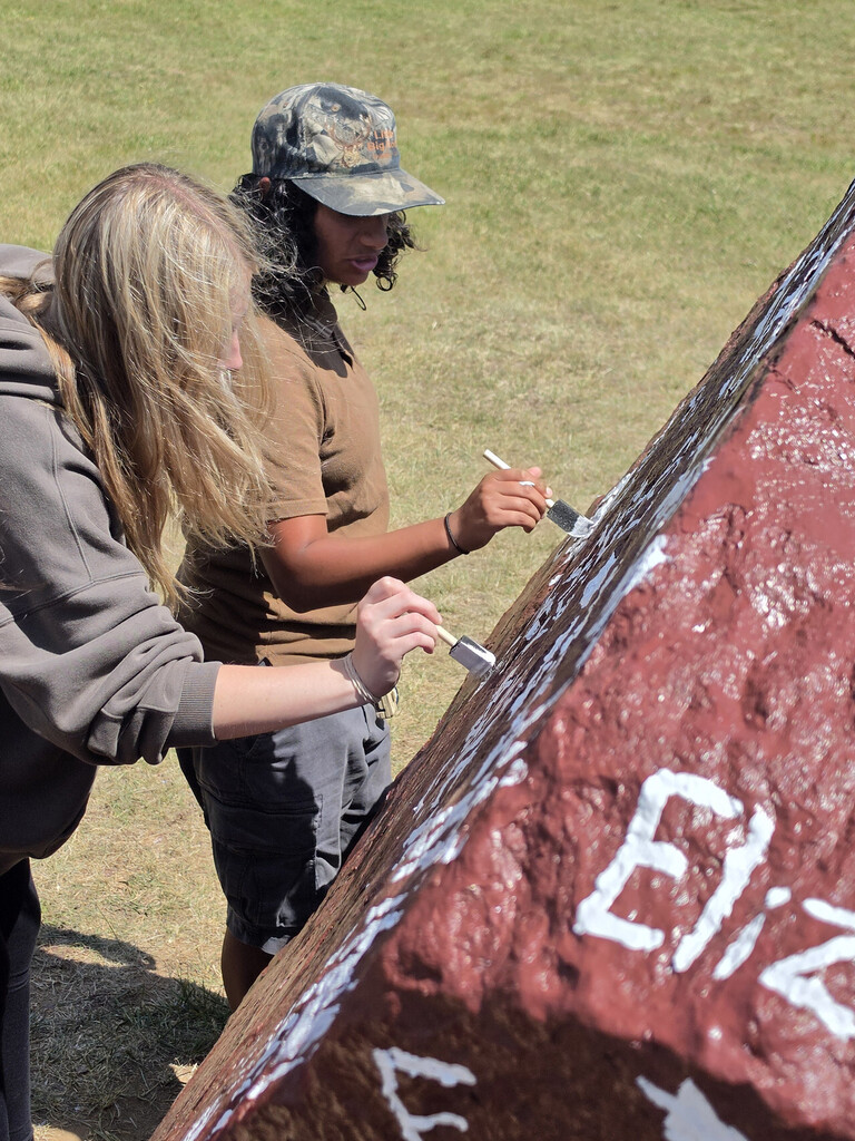 photo of OHS seniors painting Senior Rock