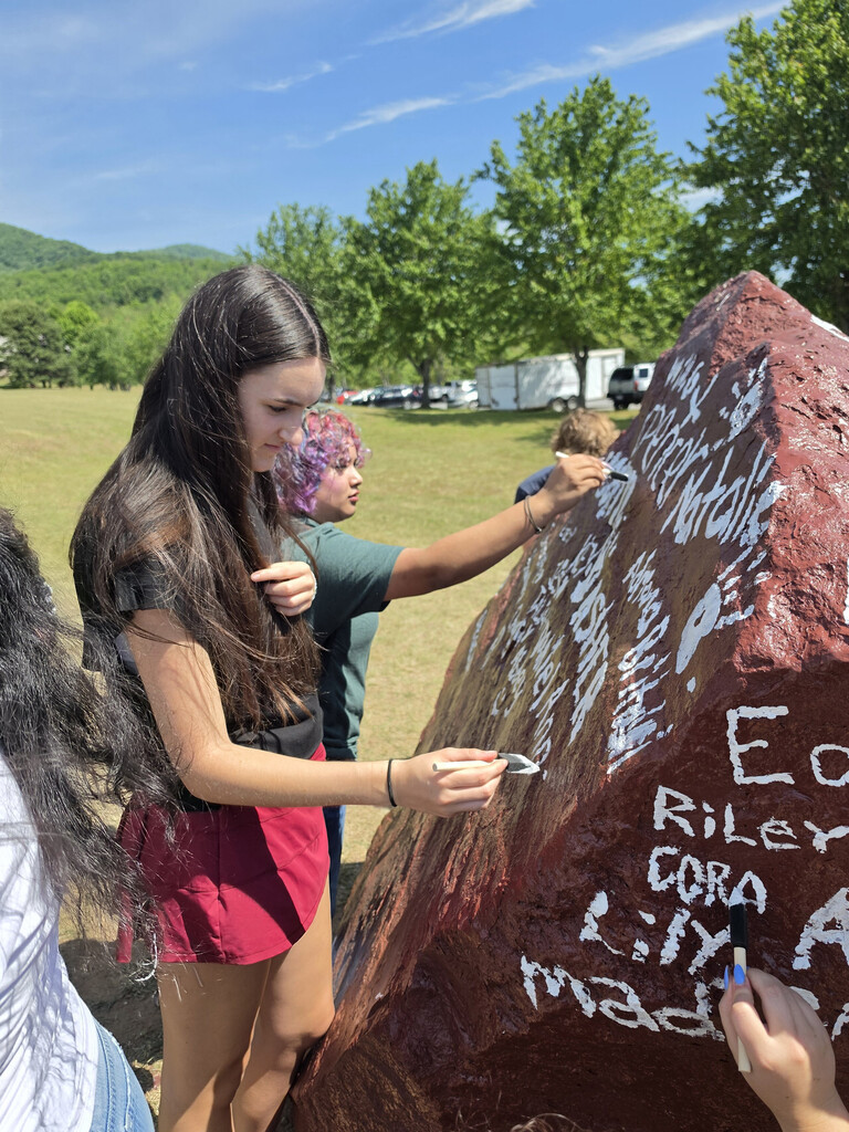 photo of OHS seniors painting Senior Rock