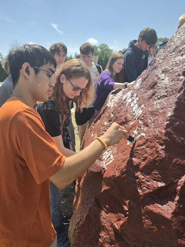 photo of OHS seniors painting Senior Rock