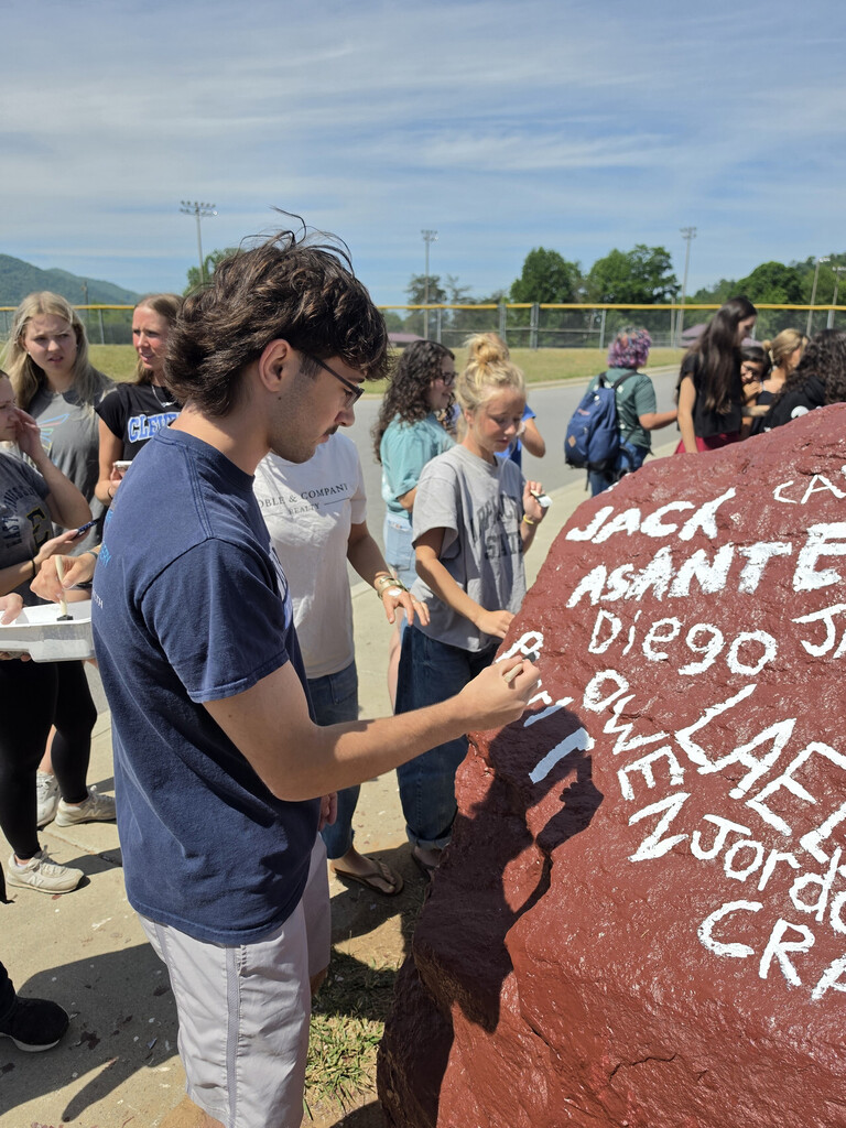 photo of OHS seniors painting Senior Rock