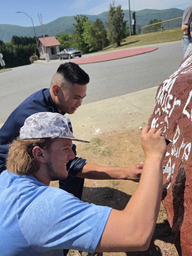 photo of OHS seniors painting Senior Rock
