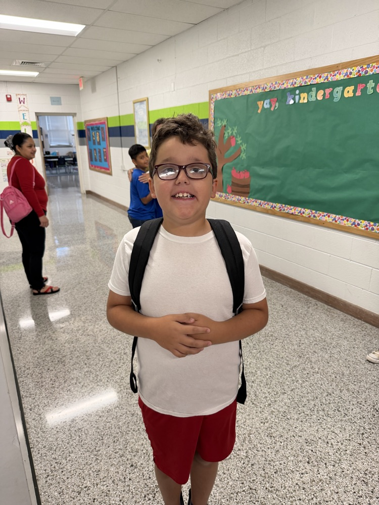 student smiles for photo.