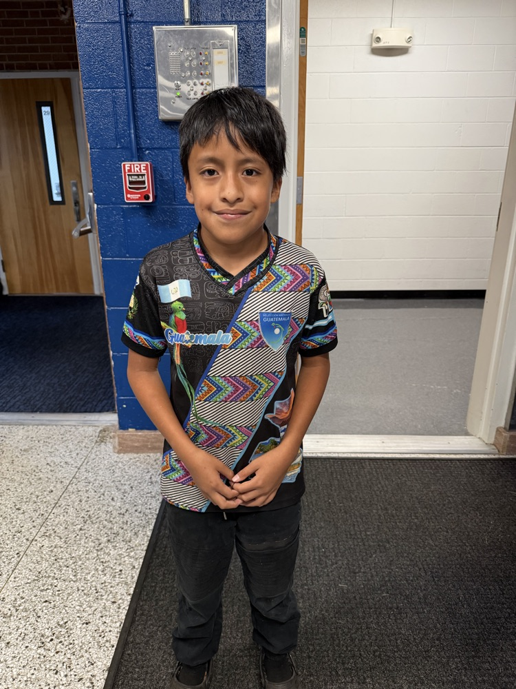 student smiles for photo